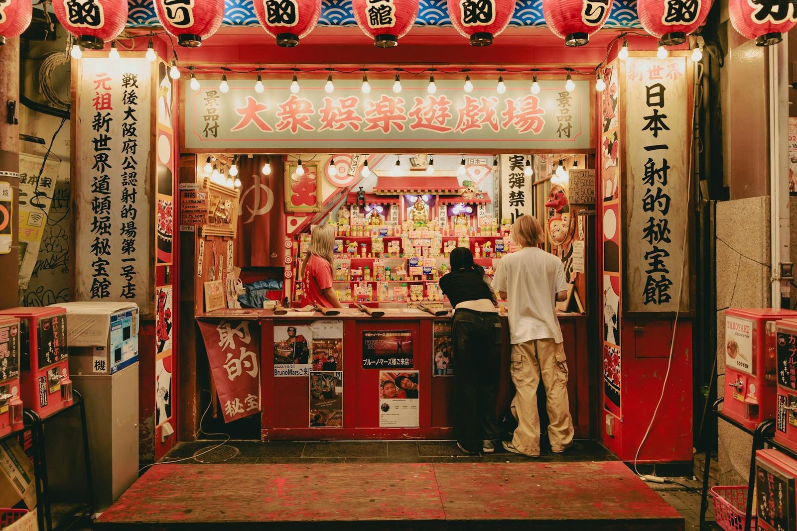 A vibrant Sydney event: a lively 360 photo booth contrasts with a classic traditional photo booth.
