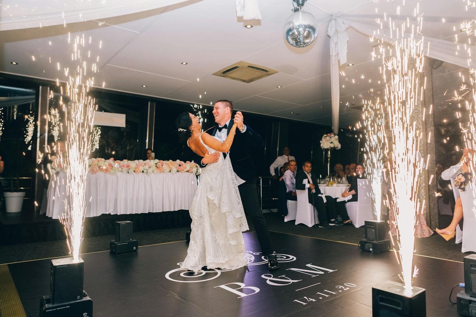Elegant wedding setup in Sydney with joyful guests sharing messages via audio guest book hire Sydney.