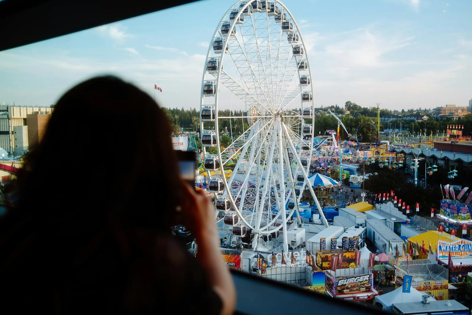 "Enjoying a vibrant 360 video booth at an event with Sydney skyline as the stunning backdrop."